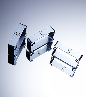 Sheet steel brackets for electrical applications made of pre-galvanized steel with teardrop interlocking, laser welded